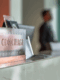 concierge sign at the main entrance of a condominium building