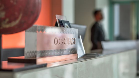 concierge sign at the front desk