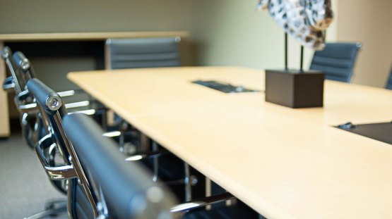 a boardroom table at the iron horse security head office when security consultation and strategy are developed