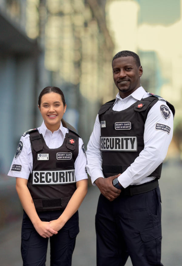 male and female iron horse security guard in tactical uniform